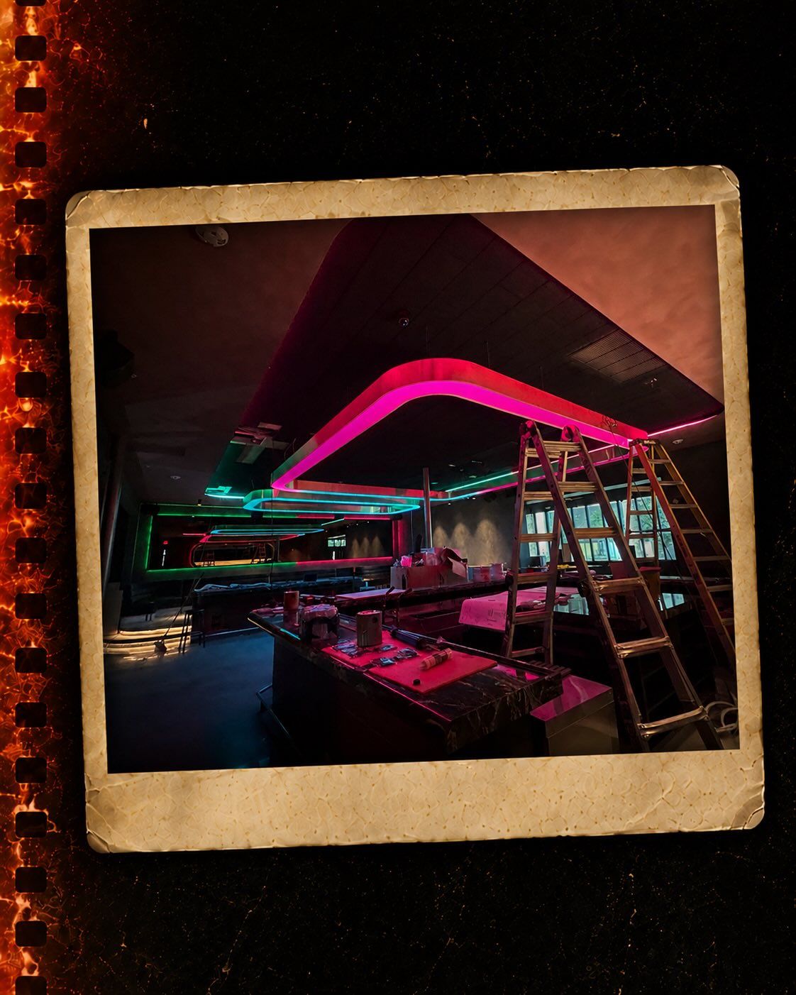 Pink light tests over the bar, print three