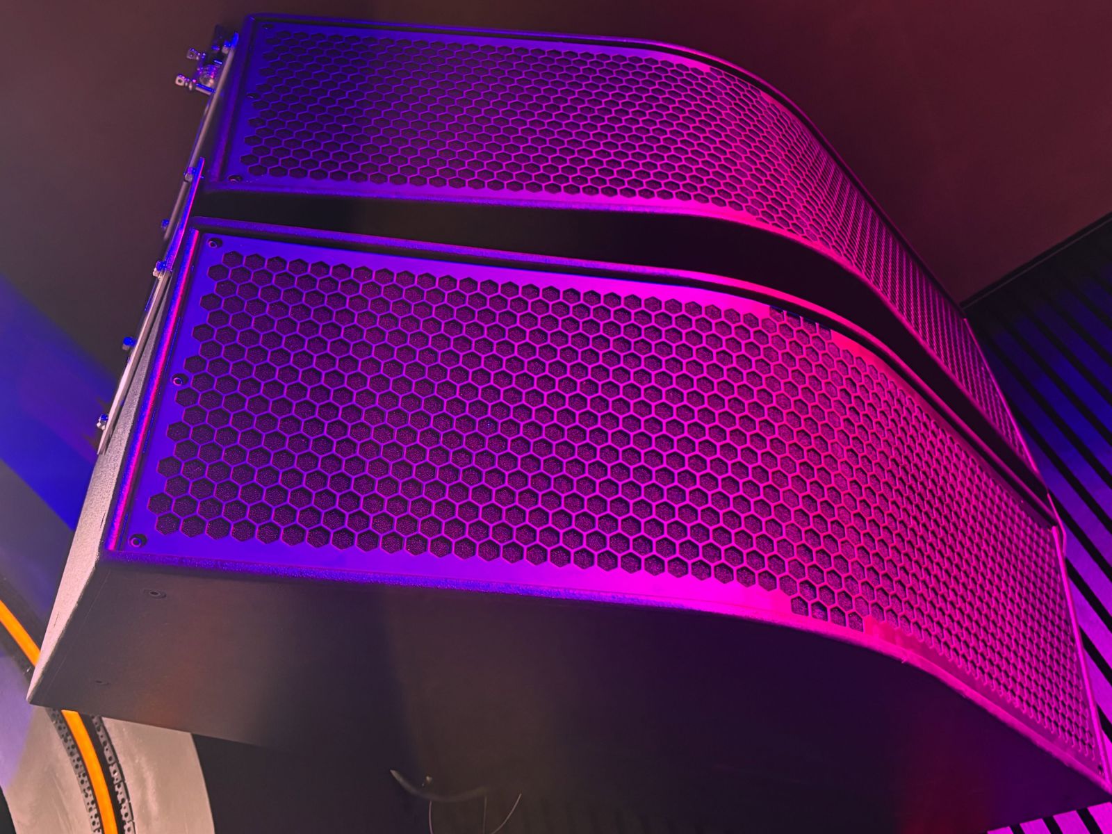 The Funktion One dance stack lit pink during install